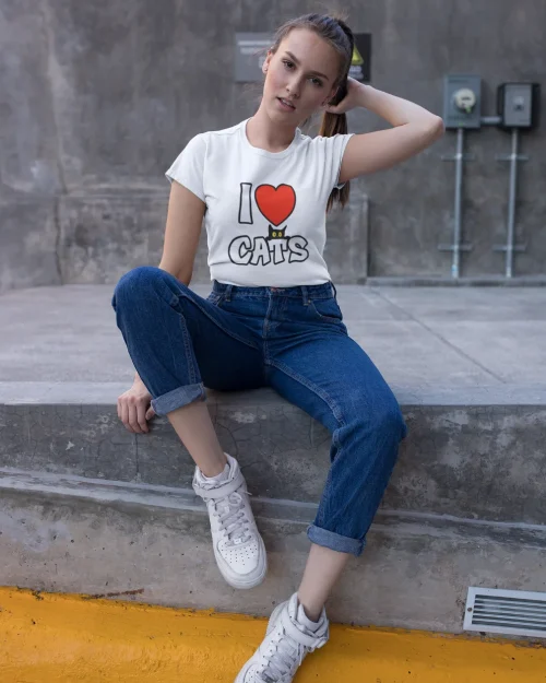 model wearing white t-shirt with black cat fun design